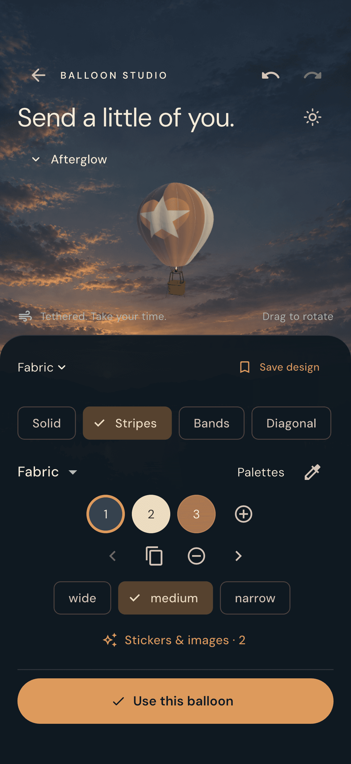 Baloon Studio showing a striped balloon with custom artwork and fabric controls